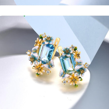 Mesmerizing Blue Stone Butterfly Earrings with Gold Accents - Sterling Silver Elegance