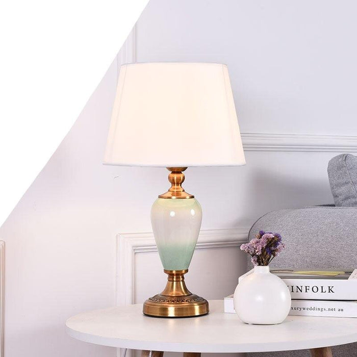 Sophisticated Metal Base Table Lamp with Fabric Shade for Elegant Home Lighting