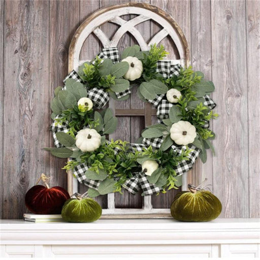 Festive Holiday Cheer: Elegant Christmas Wreath Display for Your Door