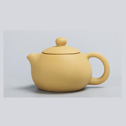 Whimsical Purple Clay Teapot Ensemble with Charming Tea Pet