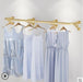 Elegant Wall-Mounted Clothing Rack for Stunning Women's Fashion Displays in Your Boutique