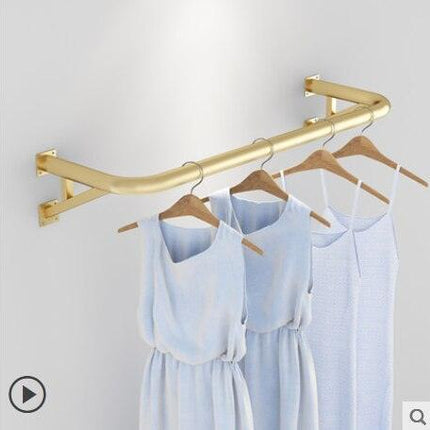 Elegant Wall-Mounted Clothing Rack for Stunning Women's Fashion Displays in Your Boutique