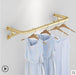 Elegant Wall-Mounted Clothing Rack for Stunning Women's Fashion Displays in Your Boutique