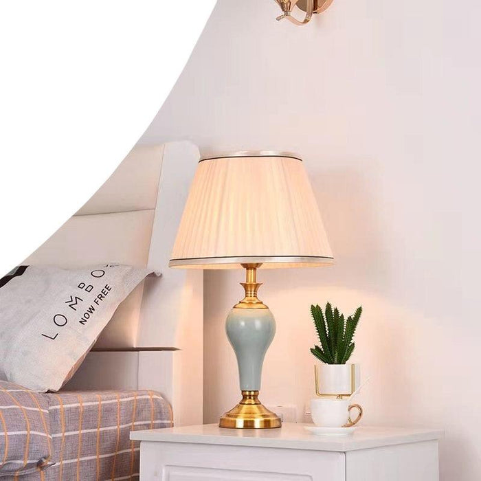 Sophisticated Metal Base Table Lamp with Fabric Shade for Elegant Home Lighting