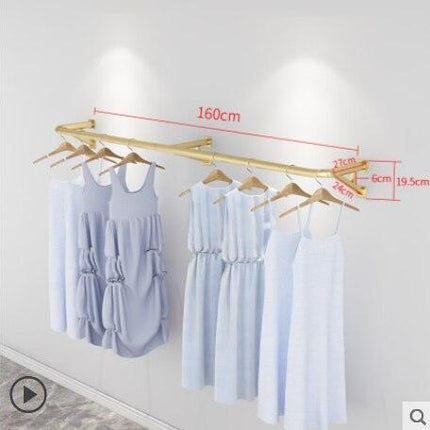 Elegant Wall-Mounted Clothing Rack for Stunning Women's Fashion Displays in Your Boutique