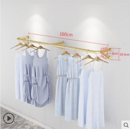 Elegant Wall-Mounted Clothing Rack for Stunning Women's Fashion Displays in Your Boutique