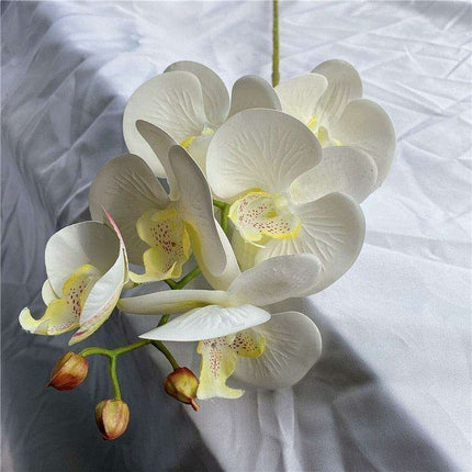 Sophisticated Elegance: Lifelike Faux Orchid Stem for Timeless Home Decor
