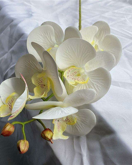 Sophisticated Elegance: Lifelike Faux Orchid Stem for Timeless Home Decor