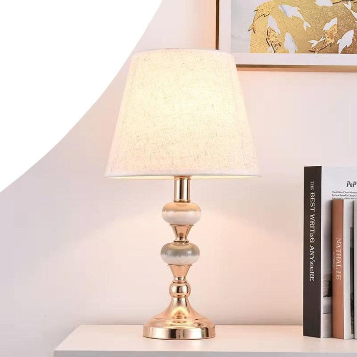 Sophisticated Metal Base Table Lamp with Fabric Shade for Elegant Home Lighting