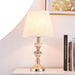 Sophisticated Metal Base Table Lamp with Fabric Shade for Elegant Home Lighting