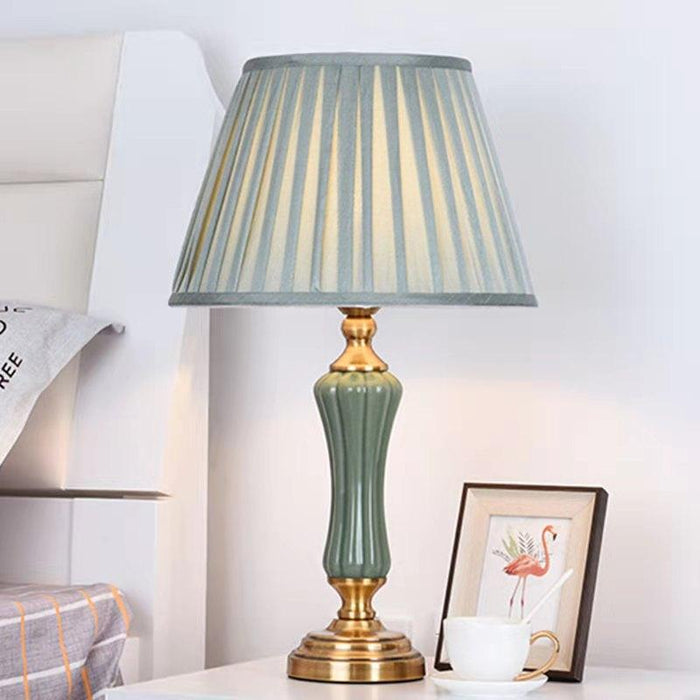 Sophisticated Metal Base Table Lamp with Fabric Shade for Elegant Home Lighting