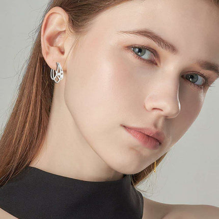 Lavish Moissanite Teardrop Earrings with Lab-Diamond Accents in White Gold and Yellow Gold Plating