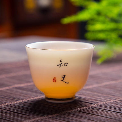 Luxurious Suet Jade Ceramic Teacup Set for a Refined Tea Experience