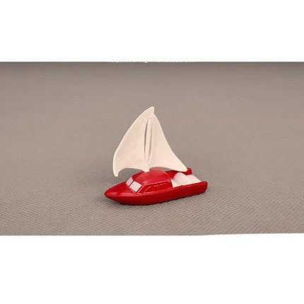 Nautical Charm: Exquisite Handcrafted Sailboat Sculpture - Très Elite