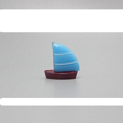 Nautical Charm: Exquisite Handcrafted Sailboat Sculpture - Très Elite