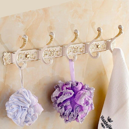 Opulent Botanical Brass Towel Rack for a Chic Bathroom Transformation - Très Elite