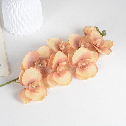 Orchid Splendor: Luxurious Silk Floral Arrangement for Stylish Living..