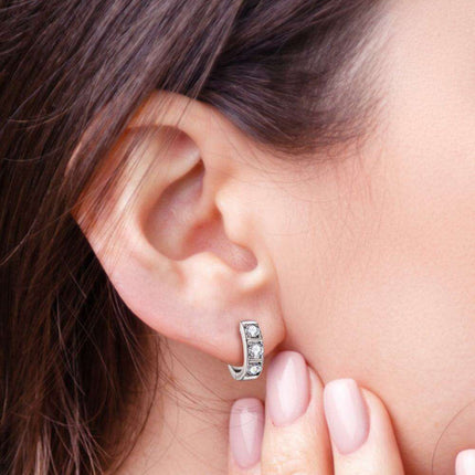 Radiant Charm: Sterling Silver Huggie Earrings with Lab-Grown Diamond Highlights