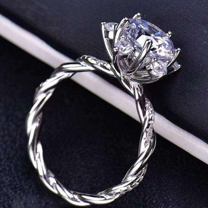 Radiant Elegance: Twisted 3 Carat Lab-Diamond Sterling Silver Ring with Platinum Touch