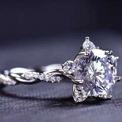 Radiant Elegance: Twisted 3 Carat Lab-Diamond Sterling Silver Ring with Platinum Touch