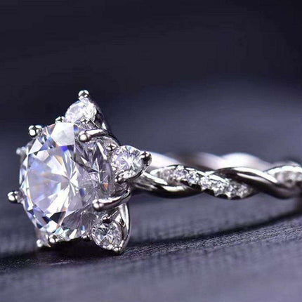 Radiant Elegance: Twisted 3 Carat Lab-Diamond Sterling Silver Ring with Platinum Touch