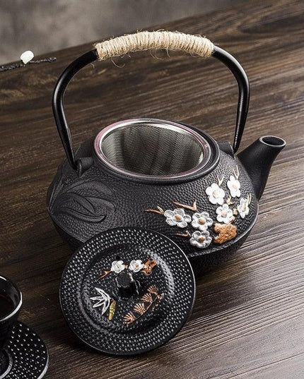 Elegant Japanese Cast Iron Tea Kettle Set with Plum and Bamboo Design - Complete Tea Serving Collection