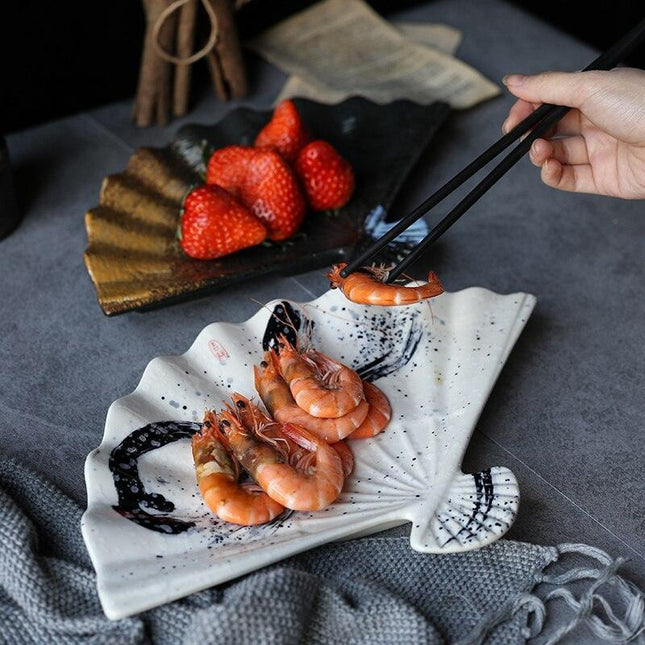 Elegant Handcrafted Fan-Shaped Ceramic Dining Plate
