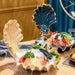 Oceanic Elegance: Artistic Shellfish Conch Sashimi Plate