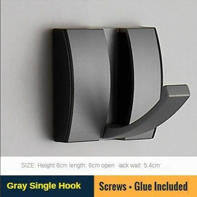Elegant Black and Gold Foldable Wall Hook Rack for Stylish Storage Solutions