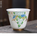 Auspicious Crane Design Mutton Fat Jade Tea Cup - Elegant and Symbolic
