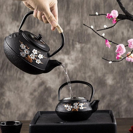 Elegant Japanese Cast Iron Tea Kettle Set with Plum and Bamboo Design - Complete Tea Serving Collection