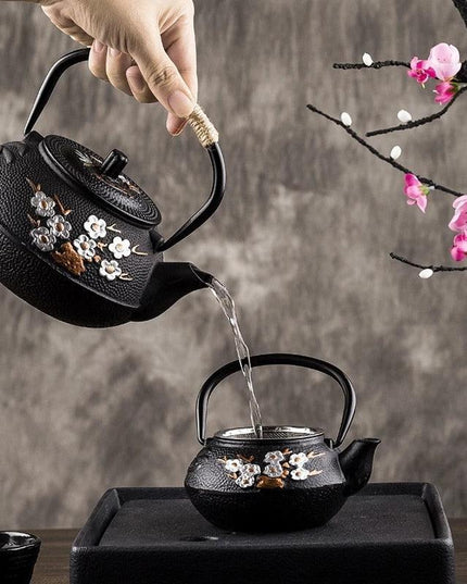 Elegant Japanese Cast Iron Tea Kettle Set with Plum and Bamboo Design - Complete Tea Serving Collection