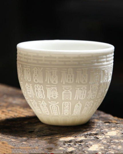 Sophisticated Handcrafted White Porcelain Tea Cup Collection with Unique 3D Relief Detail - Available in 4 Sizes