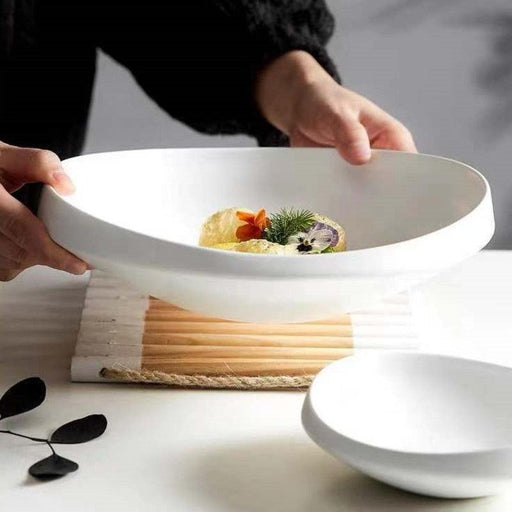 Elevate Your Dining Experience with Creative Nest Ceramic Irregular Dish Set
