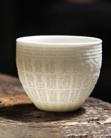 Sophisticated Handcrafted White Porcelain Tea Cup Collection with Unique 3D Relief Detail - Available in 4 Sizes