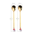 gold santa spoon