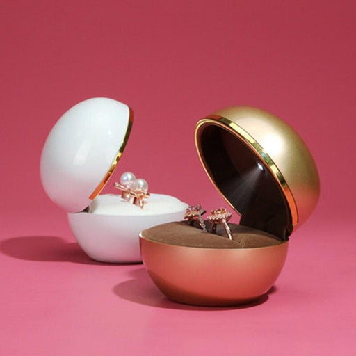 Illuminate Your Jewelry Collection with our Elegant Egg-Shaped LED Ring Box
