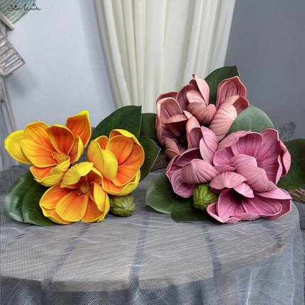 Vintage Elegance: Luxurious Magnolia Floral Arrangement with Vibrant Accents