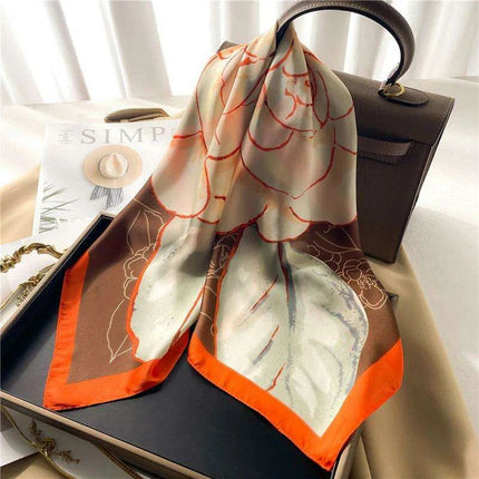 Elegant Leopard Print Silk-like Scarf: Elevate Your Style Game