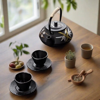 Elegant Japanese Cast Iron Tea Kettle Set with Plum and Bamboo Design - Complete Tea Serving Collection