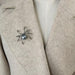 Spider Brooch: Bold Black and White Fashion Accessory