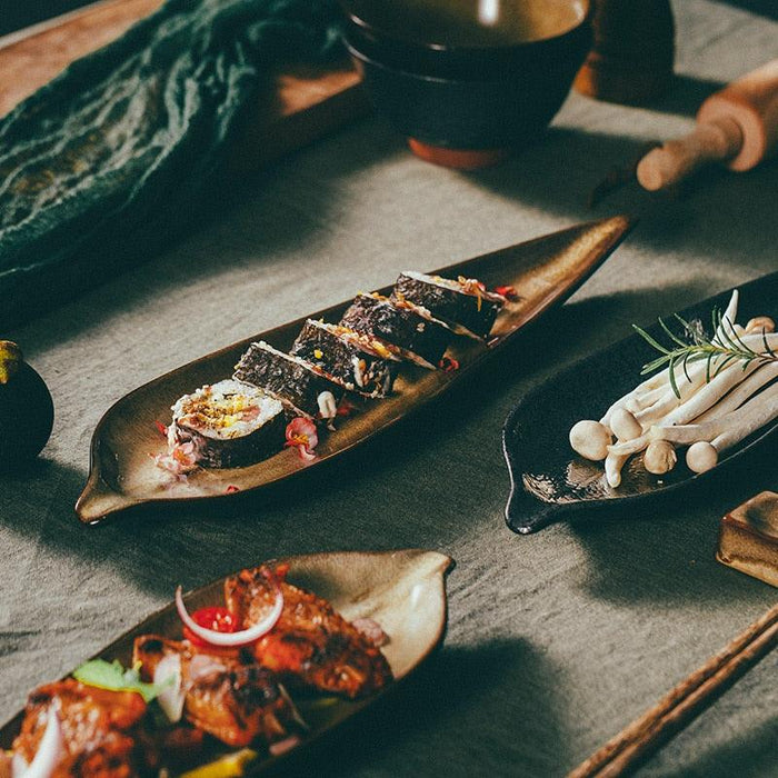 Elevate Your Dining Experience with a Stunning Set of Japanese Ceramic Leaf Sushi Plates