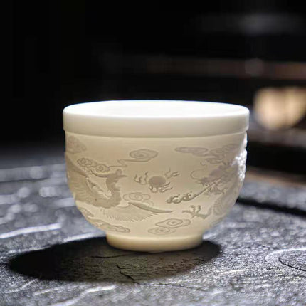 Sophisticated Handcrafted White Porcelain Tea Cup Collection with Unique 3D Relief Detail - Available in 4 Sizes