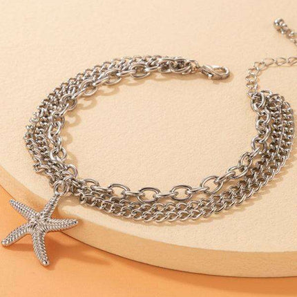 Serpent Heart Charm Triple-Layered Anklet with Elegant Tassel - Très Elite