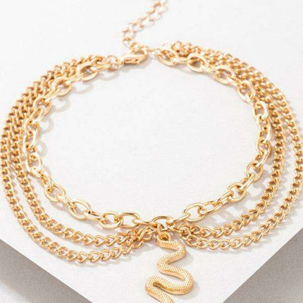 Serpent Heart Charm Triple-Layered Anklet with Elegant Tassel - Très Elite