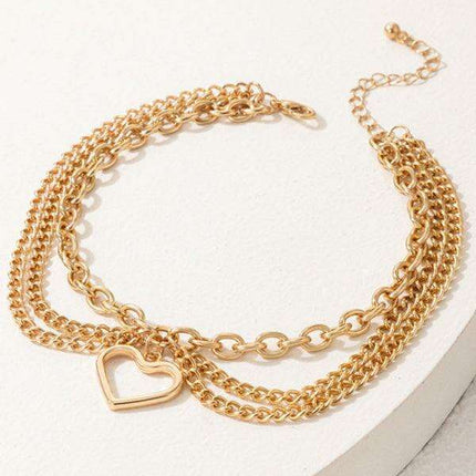 Serpent Heart Charm Triple-Layered Anklet with Elegant Tassel - Très Elite