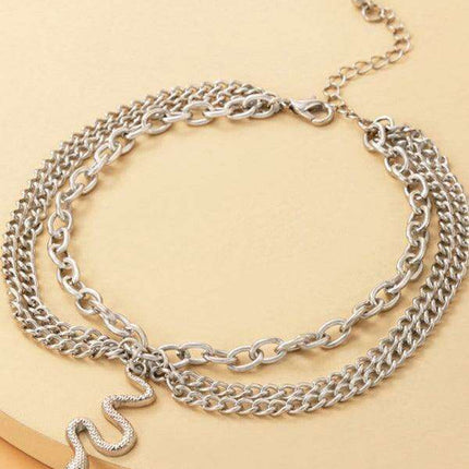 Serpent Heart Charm Triple-Layered Anklet with Elegant Tassel - Très Elite