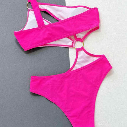 Sleek Asymmetrical Swimsuit with Fashionable Grommet Details