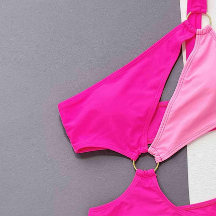 Sleek Asymmetrical Swimsuit with Fashionable Grommet Details