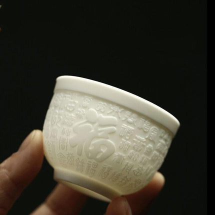 Sophisticated Handcrafted White Porcelain Tea Cup Collection with Unique 3D Relief Detail - Available in 4 Sizes